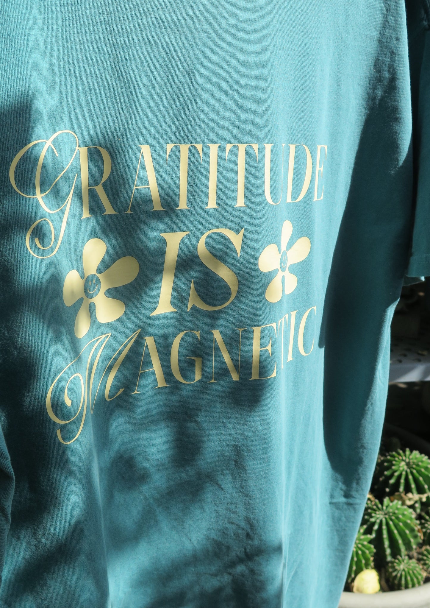 'Gratitude is Magnetic' Emerald Tee